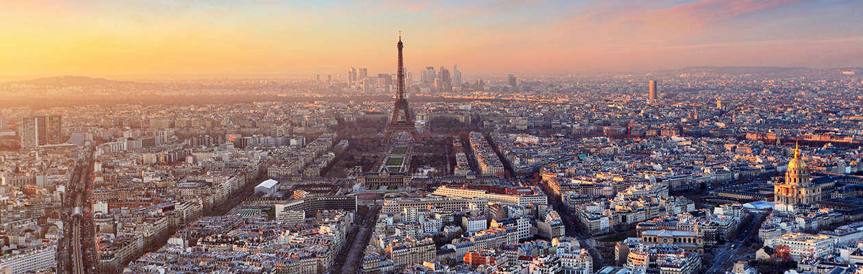 Aerial image of Paris with the Eiffel Tower a key focus at dusk