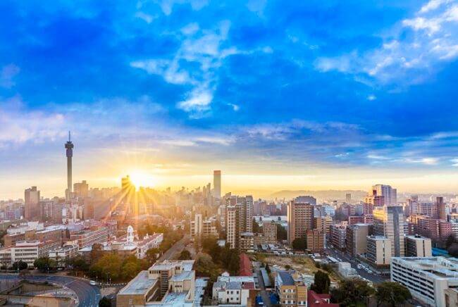 Johannesburg skyline with the sun shining 