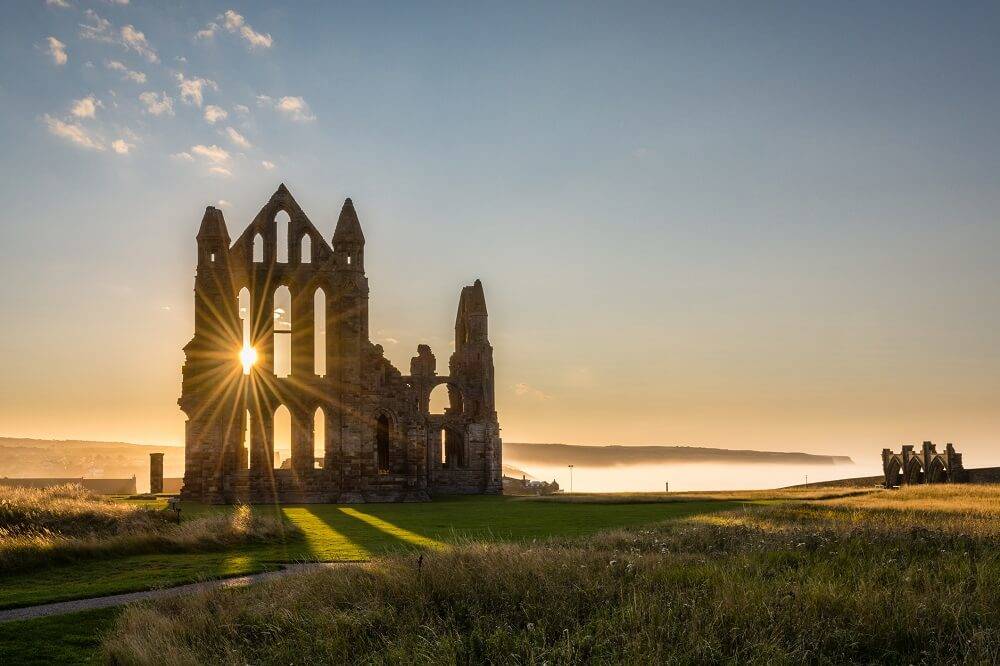 whitby abbey in yorkshire at sunset