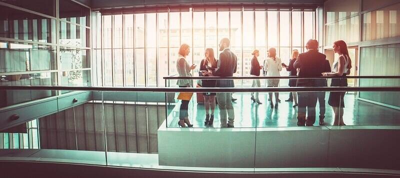 Group of legal professionals in a hallway